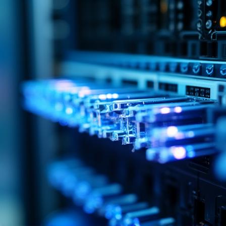 High-tech server room with glowing blue data cables